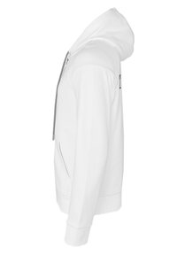 Vit hoodie med framdragkedja, justerbar huva och ribbade ärmslut. Har en känguruficka och en mjuk, slät textur.