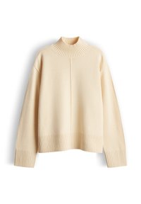 Cremefarbener Rollkragenpullover aus weichem Stoff mit gerippter Struktur am Kragen und Saum, mit lockerem Schnitt und abgefallenen Schultern.