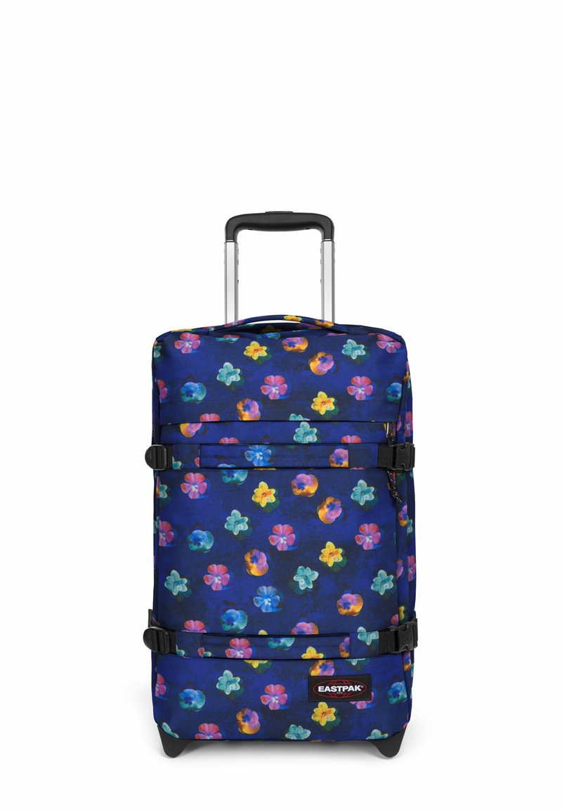 Maleta con ruedas en tejido azul oscuro con un vibrante patrón floral multicolor. Cuenta con correas duales, un asa retráctil y acentos negros.