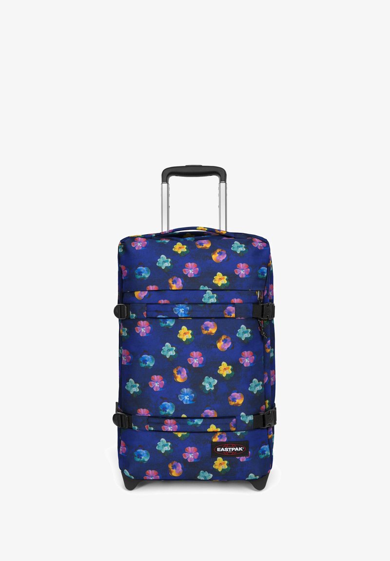 Maleta con ruedas en tejido azul oscuro con un vibrante patrón floral multicolor. Cuenta con correas duales, un asa retráctil y acentos negros.