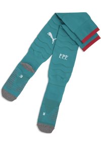 Calzini da calcio verde turchese con dettagli rossi nella parte superiore. Presentano motivi testurizzati, marchio e sezioni rinforzate nella punta e nel tallone grigio. Taglia indicata come 3.