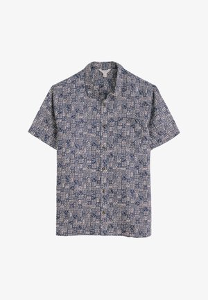 Koszula z krótkim rękawem w granatowym i kremowym kolorze, z geometrycznym wzorem z różnymi kształtami. Zapięcie na guziki z przodu i projekt kołnierza typu camp.