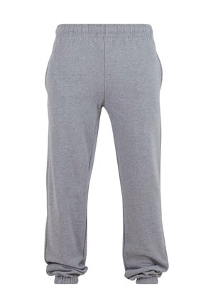 Gray sweatpants made from soft fabric, featuring an elastic waistband, side pockets, and tapered cuffs at the ankle for a relaxed fit.