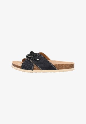 Sort vævet slide sandal med en korkfodseng og en beige gummisål. Har krydsende remme og en dekorativ sort spænde detalje.