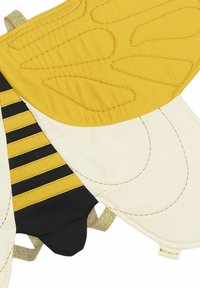 Bee-themed costume feature, with yellow and black quilted fabric, wing shapes, strap attachments, and a smooth texture.
