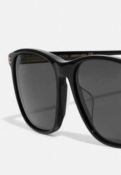 Gucci Aurinkolasit - black/grey