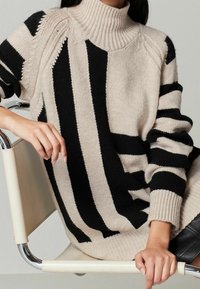 Next Neule - beige