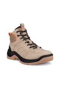 Scarponi da trekking beige con accenti neri e arancioni. Presentano una tomaia texture, supporto alla caviglia imbottito e suola in gomma per una buona aderenza.
