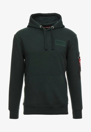 Tummanvihreä huppari, jossa on edessä kengurutasku, kiristettävä huppu ja vetoketjullinen hihan tasku punaisilla yksityiskohdilla. Pehmeä, tekstuuriainen kangas.