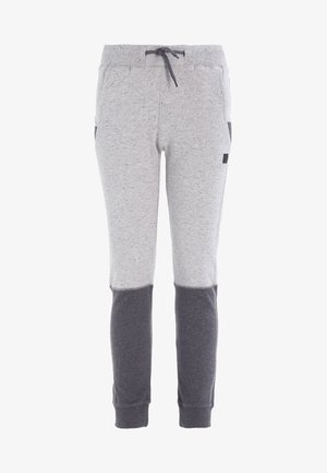 Szare dresy z ciemnoszarymi panelami na kolanach, ściągacz w pasie z sznurkiem, boczne kieszenie i zakończenia nogawek ze ściągaczami.