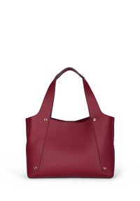 Bourgogne læder tote taske med brede håndtag, guldfarvede nitter og et struktureret, minimalistisk design.