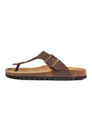 Sandale en cuir marron avec une boucle métallique, semelle intermédiaire en liège, semelle intérieure texturée et semelle en caoutchouc avec des détails de grip.