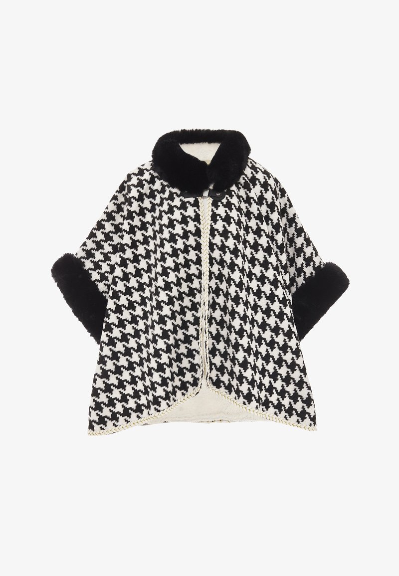 Černobílý pléd v houndstooth vzoru, zdobený límcem a manžetami z umělé kožešiny, lemovaný zapleteným detailem podél předních okrajů.