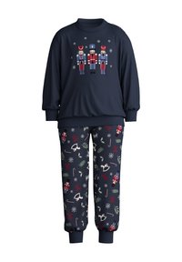 Donkerblauw pyjama set met een langhals top met notenkrakerprint en gestippelde broeken met winterthema's zoals sneeuwvlokken en hulst.