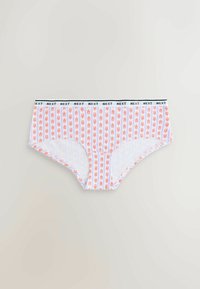 Sous-vêtements de style hipster blancs avec des motifs de homard orange et une ceinture blanche répétant le mot "NEXT" en lettres noires.