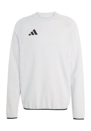 Felpa atletica bianca a maniche lunghe con logo Adidas nero sul petto sinistro e bordi neri su polsini e orlo.