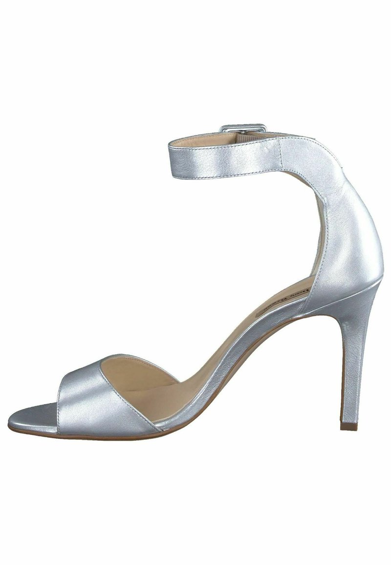 Sandali alti metallici argento con punta aperta, cinturino alla caviglia e design elegante. Presentano una superficie liscia e un tacco curvo.