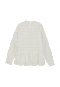 Vit blus med långa ärmar, dekorativa vertikala ränder, rynkad peplum-nederdel och en nyckelhålöppning i ryggen. Lätt, texturerad tyg.
