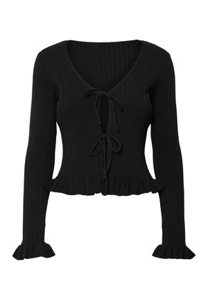 Haut noir en maille côtelée à manches longues avec col en V, deux fermetures à nouer à l'avant, ourlet volanté et poignets volantés.