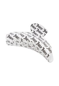 Witte haarclauw met een gebogen ontwerp, versierd met zwart 'Juicy' tekst in een herhalend patroon. Gladde plastic textuur met een glanzende afwerking.