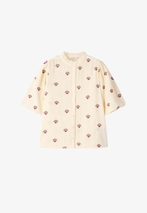 Crème korte mouwen blouse met knoopsluiting, gerimpelde kraag en een bordeauxrode schelpenprint over het geheel.