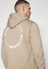 Peak Performance ORIGINAL GRAPHIC HOOD AVID - Hoodie - avid beige