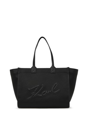 Sac fourre-tout en cuir noir texturé avec deux poignées et grand logo "Karl" en relief en écriture cursive sur le devant.