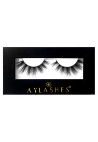 Black faux mink false eyelashes displayed in a clear windowed box with a black background and gold text. Soft, long, and layered design.