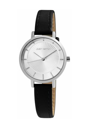 Round silver watch with textured white dial, minimal hour markers, "JUST WATCH" logo, and black leather strap.