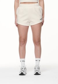 Pegador - WILUNA HIGH WAISTED - Pantaloni sportivi - washed coconut milk/black Immagine in miniatura 1