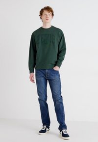 Levi's® 502™ TAPER - Džínsy tapered fit - records on
