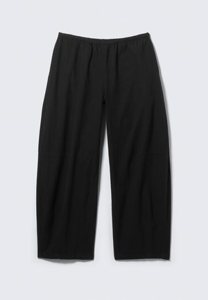 Lässige schwarze Hose mit elastischem Bund und geraden, weiten Beinen, flach auf einem hellen Hintergrund präsentiert.