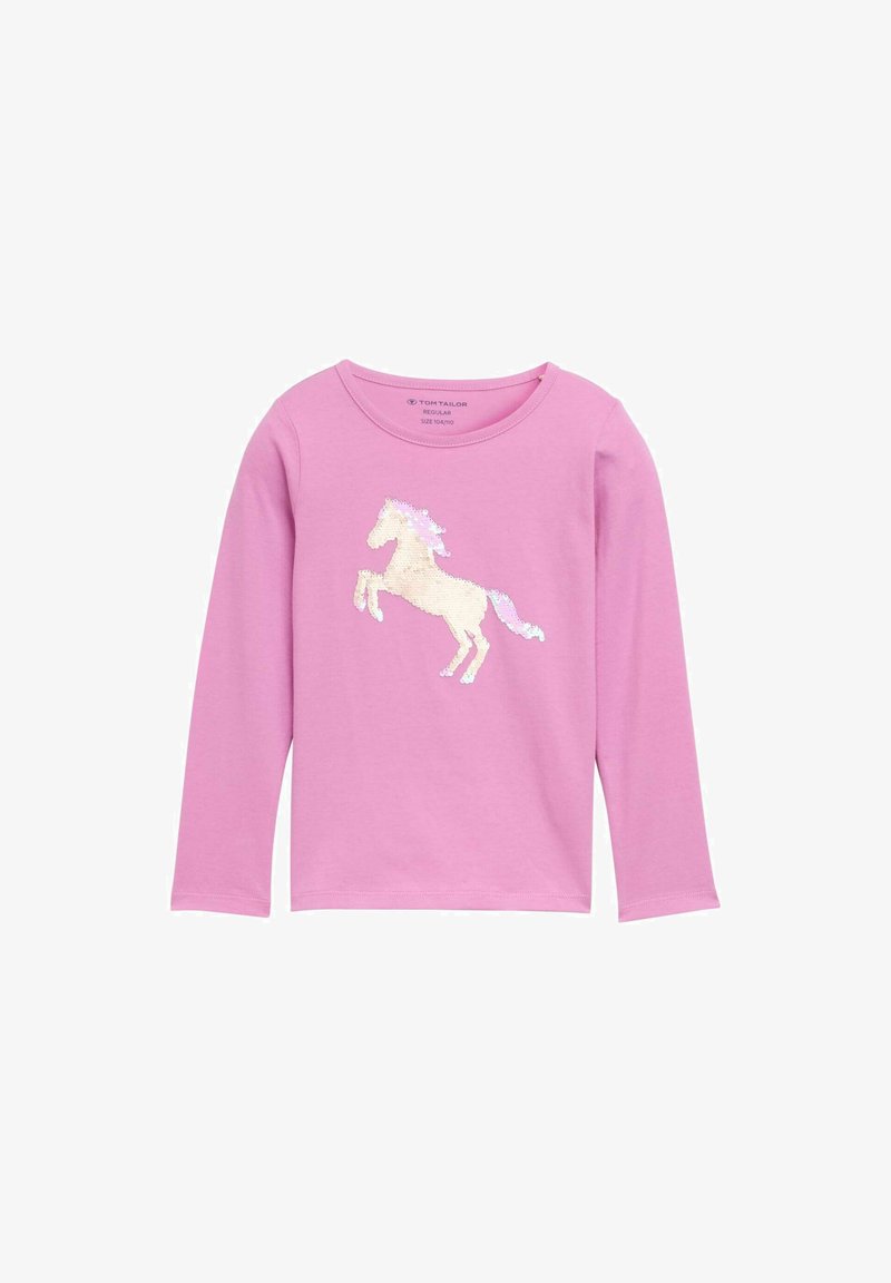Dlhý rukáv ružová košeľa z bavlny, so strihanou grafikou jednorožca v bielej farbe s pastelovou hmanou a chvostom. Okrúhly výstrih, voľný strih.