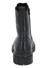 Bota de cuero negro de tobillo con cierre de cremallera, superficie texturizada, punta redondeada y suela de goma gruesa con costura blanca en contraste.