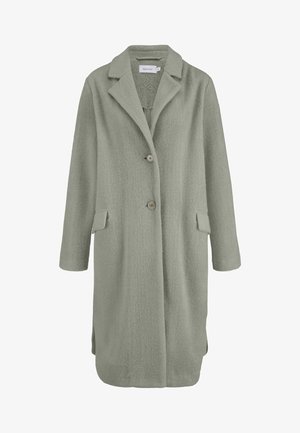 Hellgrüner Wollmantel mit geknöpftem Kragen, zwei vorderen Taschen, drei Knöpfen und einer weichen, strukturierten Oberfläche. Lange Ärmel und seitliche Schlitze.
