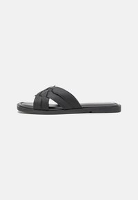 Tamaris Platt slip-in - black