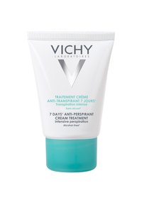 Weißer Tube mit türkisfarbenem Sockel, der silberne Schriftzüge trägt. Auf dem Etikett steht "Vichy" und "7 Tage Antitranspirant-Cremebehandlung", alkoholfrei, intensive Anwendung.
