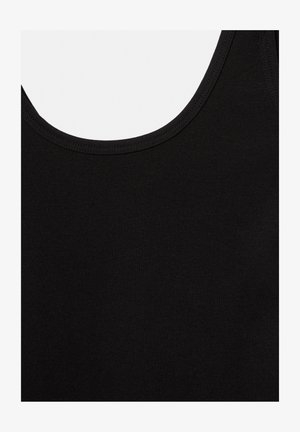 Débardeur noir sans manches avec encolure ronde, montrant la texture du tissu et les détails des coutures sur la partie avant supérieure.