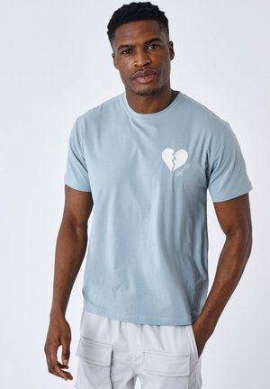 CŒUR BRISÉ - T-shirt print - bleu vert