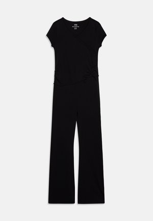 Tuta nera con scollatura a V, maniche corte e dettaglio arricciato in vita. Realizzata in tessuto morbido ed elastico; gambe larghe e svasate.