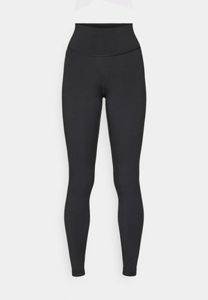 Høyt midje svarte leggings laget av elastisk stoff, med en glatt tekstur og tettsittende design, uten synlige logoer eller mønstre.