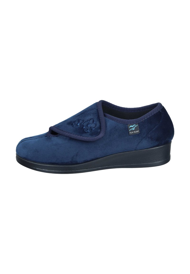 Navy blue slip-on shoe made of soft velvet, featuring a stitched floral design and a black rubber sole with a low wedge for added comfort.