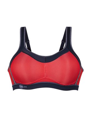 Reggiseno sportivo rosso con texture a rete, con dettagli navy, spalline regolabili e cuciture rinforzate per il supporto.