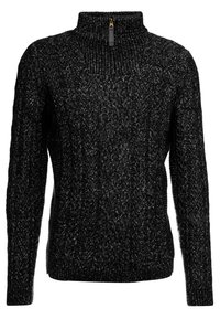 Pull noir en tricot avec un col montant, doté d'une fermeture éclair au niveau du col, d'un motif torsadé texturé, et de poignets et ourlet côtelés.