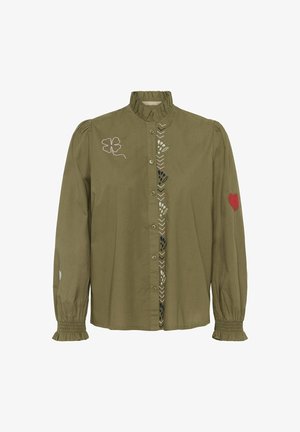 Alyvuogių žalios spalvos bliuska su aukšta raižyta apykakle, sagų uždarymu ir siuvinėtais raštais, įskaitant gėles ir raudoną širdį ant rankovių.