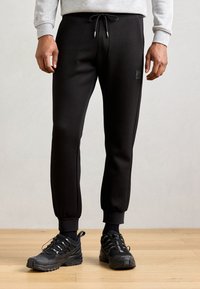 Antony Morato TROUSERS REGULAR FIT LOGOED METAL BADGE RUBBER PATCH - Tepláky - black