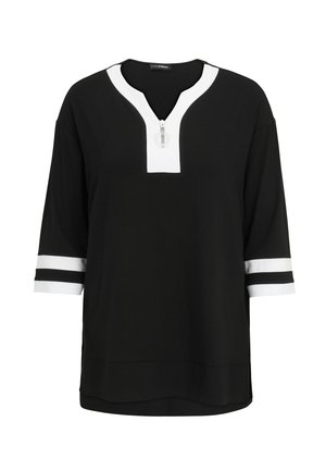 Black jersey top with a white V-neck collar and zip, featuring three-quarter sleeves with black and white stripes. Soft texture, relaxed fit.