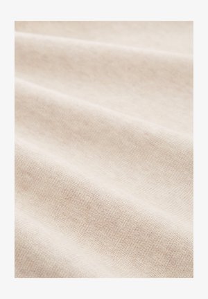 Svijetlo bež tkanina s glatkom teksturom, koja ima suptilne, fino pletene uzorke i meko pada, stvarajući nježne valove.