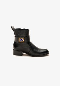 Unselected, schwarz lila gold