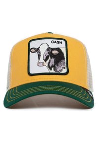 Cappello giallo con visiera verde, caratterizzato da una parte posteriore in rete bianca. La parte anteriore presenta un grafiche di una mucca ricamata all'interno di un contorno rettangolare con la scritta "CASH."